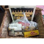 A basket containing Sunny Jim and Small Rosebud 207/2 baby doll and other items