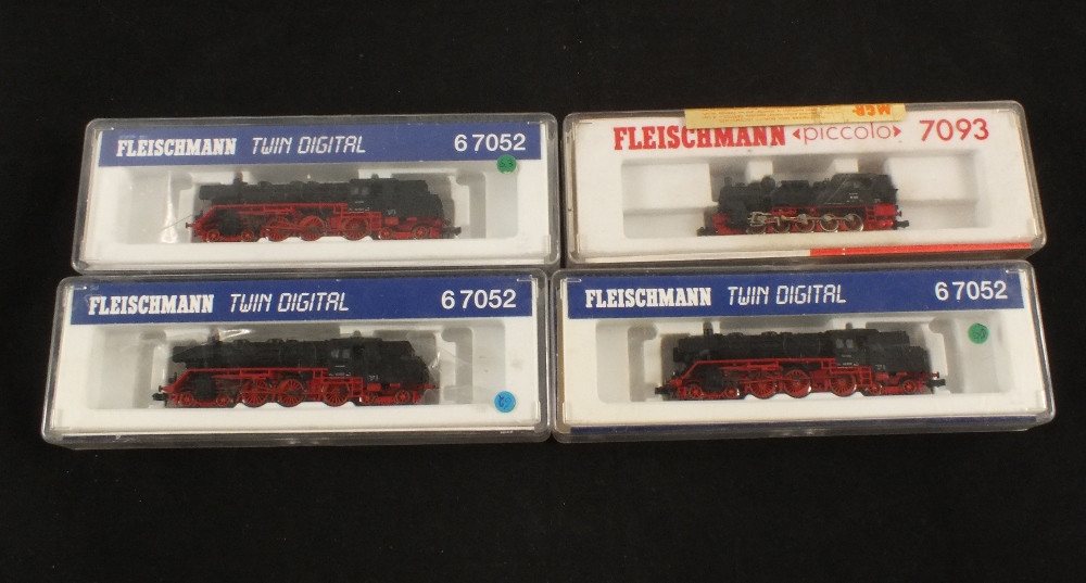 Three boxed Fleischmann twin digital locos and one other