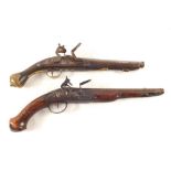 An 18th Century continental Flintlock pistol with one other similar Flintlock pistol