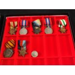 A collection of medals including Africa Star and Atlantic Star,