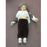 A large English vinyl dressed doll