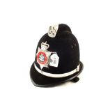 A Police helmet (Coxcomb) with South Wales plate,