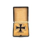 A Third Reich era Iron Cross 1st class (vertical pin) in its original box