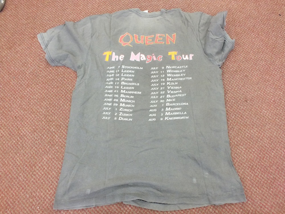 Two Grey Queen The Magic Tour T-Shirts

Size L

Note: With some damage and holes - Image 4 of 4