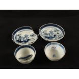 A pair of blue and white chinoiserie tea bowls and saucers (some damage)