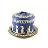 A 19th Century Wedgwood blue Jasperware cheese bell with classical figure decoration (base