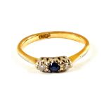 An 18ct Gold, Sapphire and Diamond three stone ring,