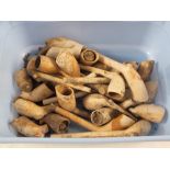 A quantity of clay pipes