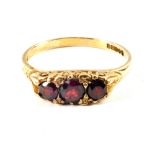 A 9ct Gold three stone Garnet ring,