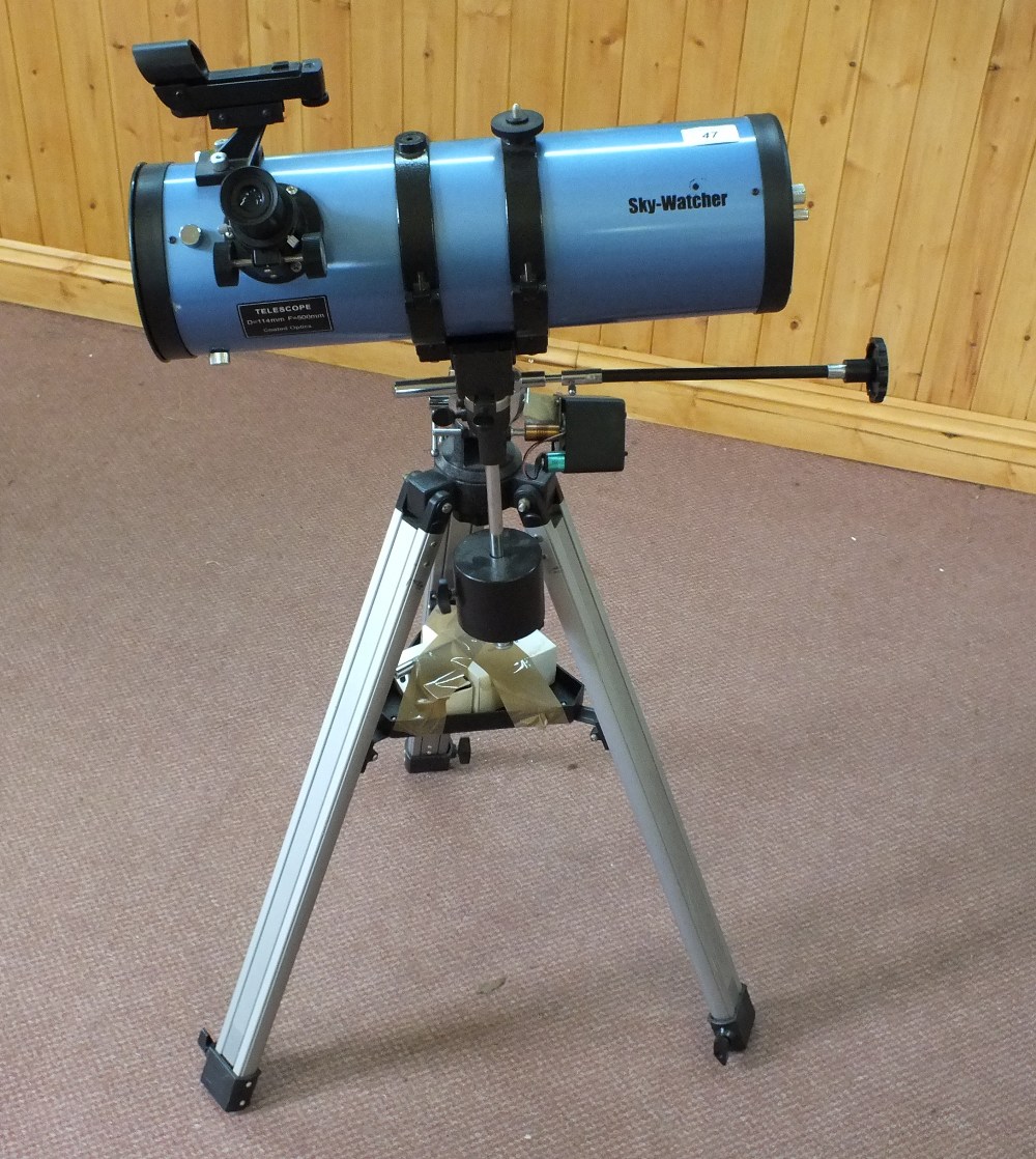 A Sky Watcher D 114mm F500mm astronomical telescope and tripod