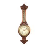 A carved Oak banjo barometer