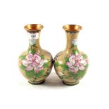 A pair of floral cloisonné vases,