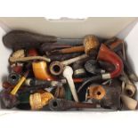 A pipe collection including Meerschaum Turks head,