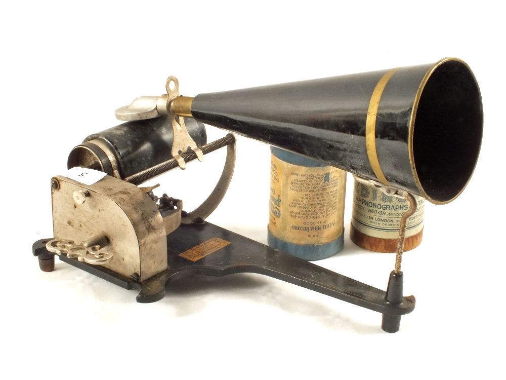 A Columbia phonograph "The Gramophone" with black Japanned horn and two cylinders