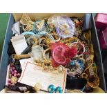 A large box of costume jewellery, watches,