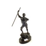 A spelter figure of a boy scout,