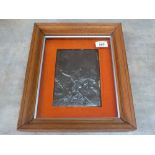 A framed relief metal battle scene plaque,