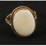 A 9ct Gold ring set with a large Opal,