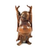 A Chinese carved hardwood standing Buddha,