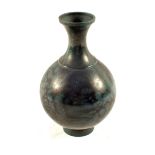 A Japanese mottled blue metal vase, signed,