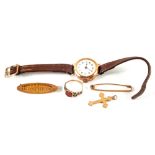 A lady's Gold wristwatch, a 9ct Gold cross and bar brooch,