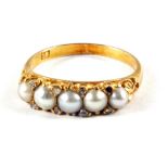 An 18ct Gold Pearl and Diamond set ring (one Diamond missing),