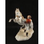 A Herend model of a rearing horse and trainer,