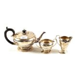 A Silver three piece tea set,