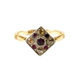 An 18ct Gold Art Deco Ruby and Diamond ring in square setting,