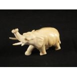 A vintage oriental Ivory carving of an Elephant