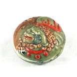 A 19th Century Japanese porcelain circular box with an erotic scene under the lid