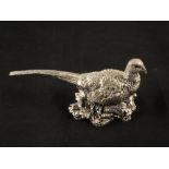 A hallmarked Silver clad pheasant, 3 1/2" high, 7 1/2" overall,