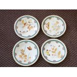 Two Worcester butterfly and floral plates and two part comports