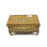 A heavy Brass casket with relief medieval scene decoration