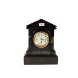 A black slate mantel clock