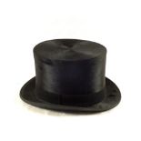 A London made top hat,