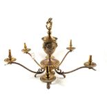 A pair of heavy five branch Brass light fittings with acanthus and rams head decoration