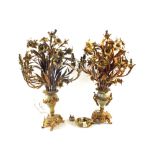 A large pair of Ormolu and Onyx table lamps with multiple light fittings and floral decoration,