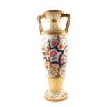 A large 19th Century porcelain floral, gilt and bird decorated vase (cracked),