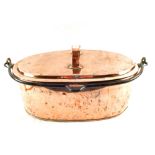 A 19th Century oval seamed Copper fish kettle with lid and iron swing handle,