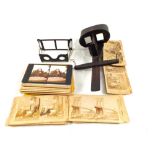 A wooden handheld stereo viewer and slides plus one other (slides English and American scenes)