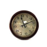 A German Kienzle eight day dial clock with Pine and Mahogany case,