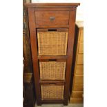 A single drawer cabinet with three wicker baskets