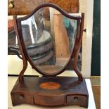 A Georgian Serpentine inlaid shield shaped dressing table mirror