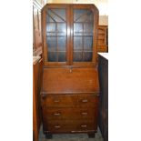 A glazed Oak bureau bookcase