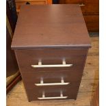 A seven drawer Pine chest and a three drawer bedside cabinet