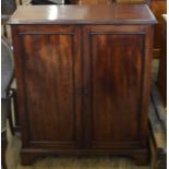 A Mahogany two door cupboard