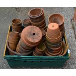 A boxed quantity of terracotta pots