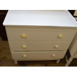 A chest of three long drawers, dressing table,