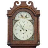 An Oak cased eight day longcase clock with painted broken arch dial,